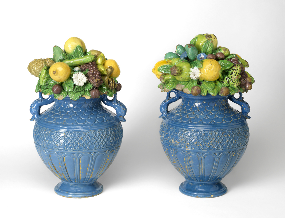 Pair of two-handled vases and covers with fictive fruit and vegetation